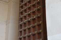Spikes on the upper portion to stop attackers using elephants to push them in.